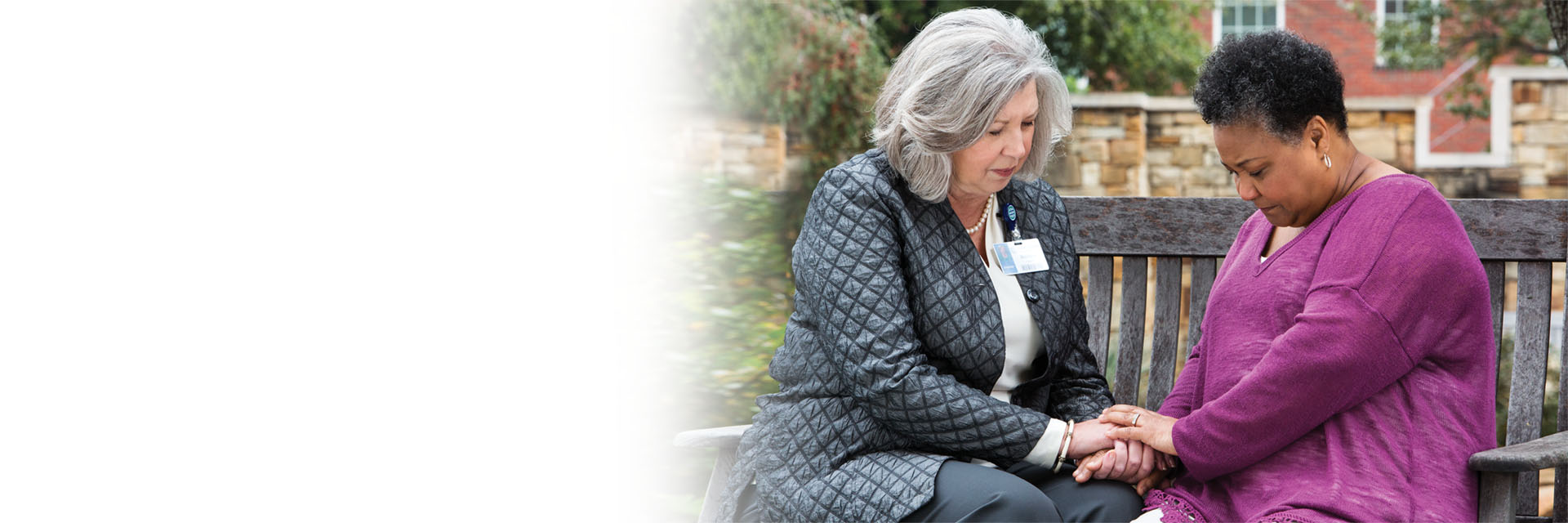 Women Holding Hands and Praying
