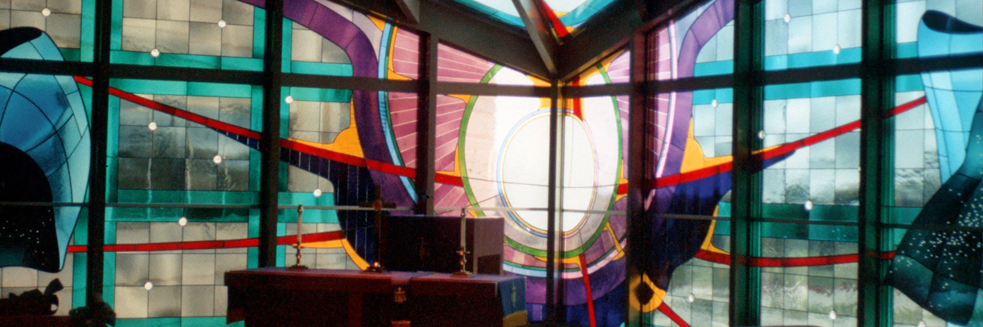Stained Glass Behind Podium in Plano Chapel