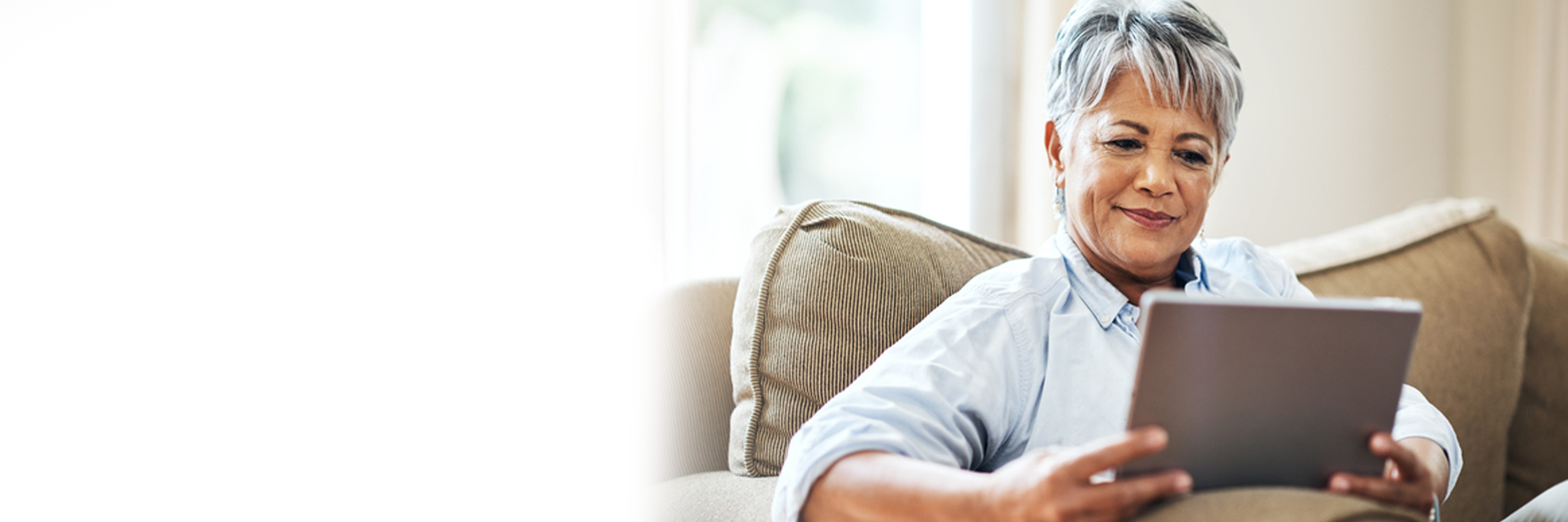 Mature Woman Holding Tablet