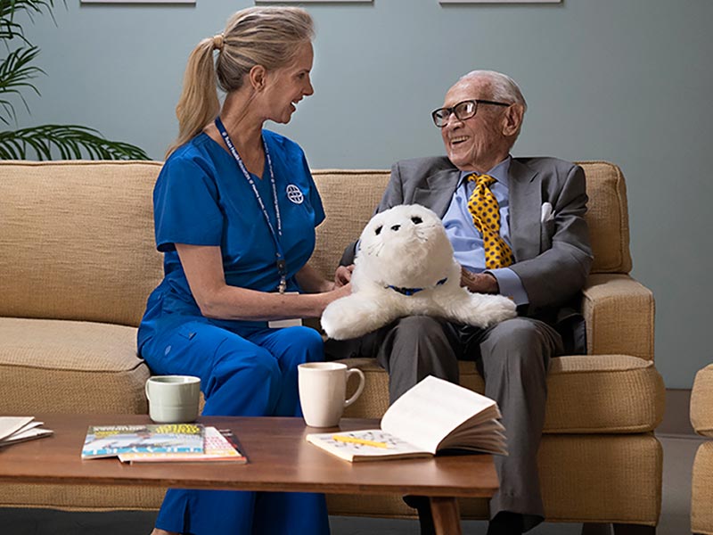 Patient and provider sitting on couch